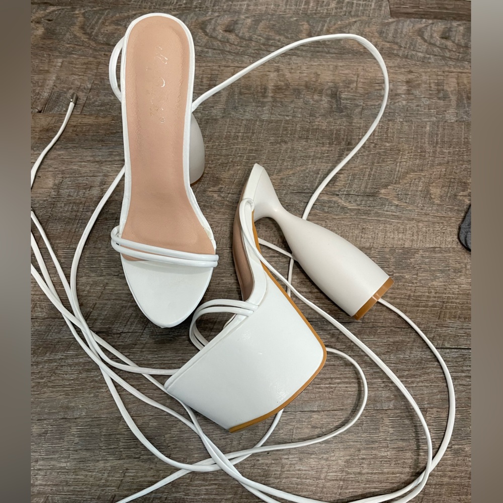 Brand new white heels.